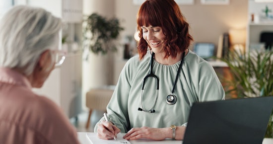 <p>Doctor, senior patient or writing prescription, results or notes for checkup, diagnosis or consulting. Mature female person, medical or healthcare worker filling paperwork or life insurance documents</p>