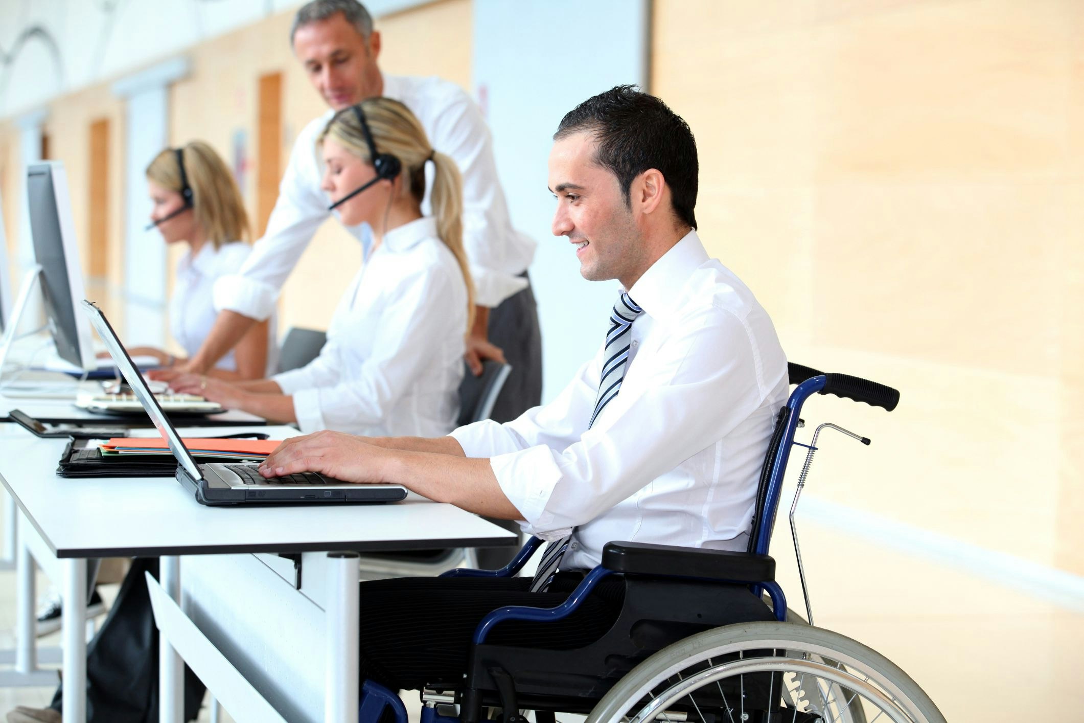 People with disability contend with a different labour market, a different employment journey and a different workplace culture. How long can they keep their head above water? [Source: Shutterstock]
