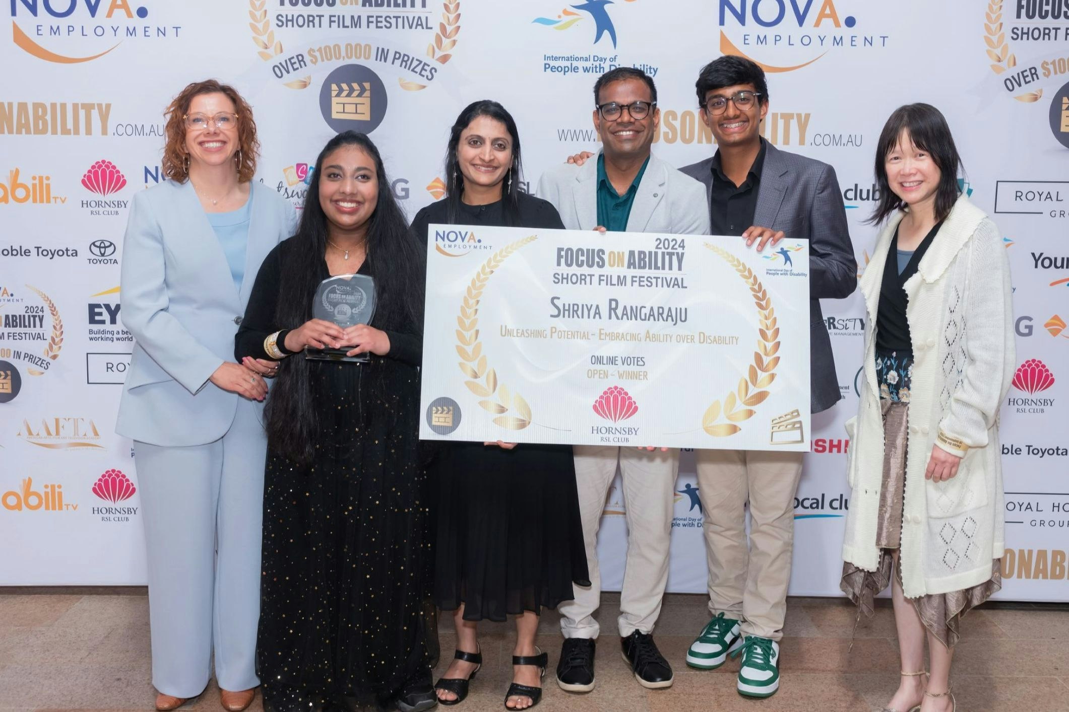 Minister Rishworth, left, is pictured with Shriya Rangaraju, second to the left, who was awarded a Viewers’ Choice Award for her short film [Source: Ian Barnes; supplied]
